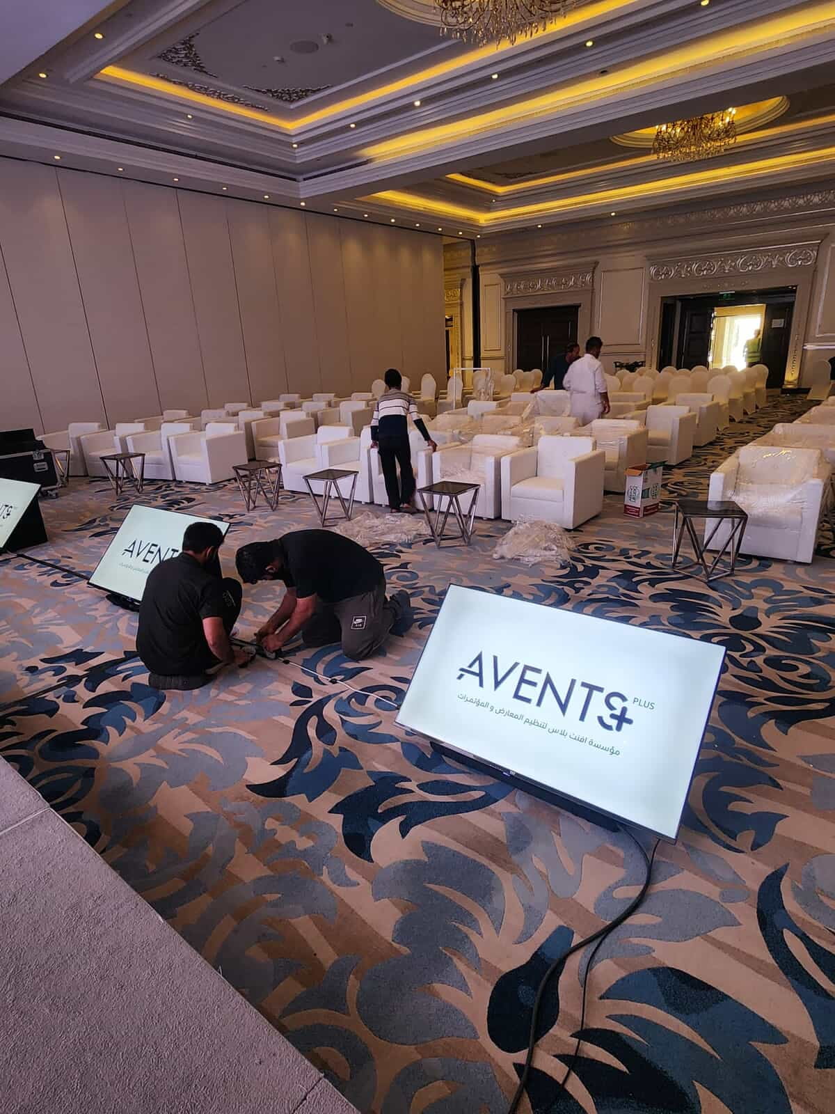 Event audiovisual setup during corporate event preparation in Riyadh