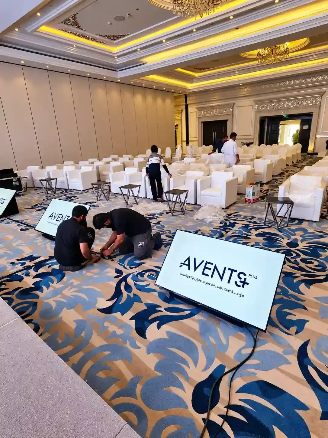 Avents Plus confidence monitors being installed for a conference event in a hotel ballroom